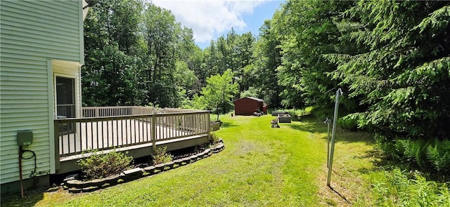 527 Harper Rd, Harpersfield, NY 13786 - view of green lawn with a deck and a storage shed