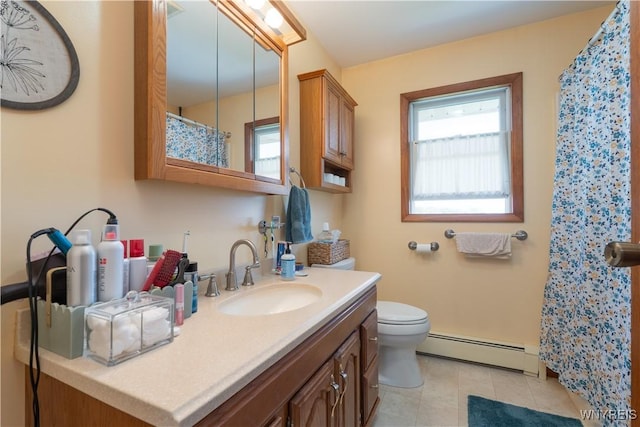7727 Dewitt Rd, Pike, NY 14024 - bathroom with baseboard heating, plenty of natural light, vanity, and tile patterned floors