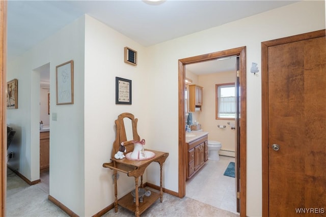 7727 Dewitt Rd, Pike, NY 14024 - hallway with a baseboard heating unit and baseboards