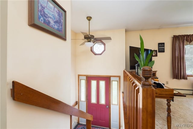 7727 Dewitt Rd, Pike, NY 14024 - carpeted entrance foyer with a ceiling fan, a towering ceiling, and a baseboard radiator