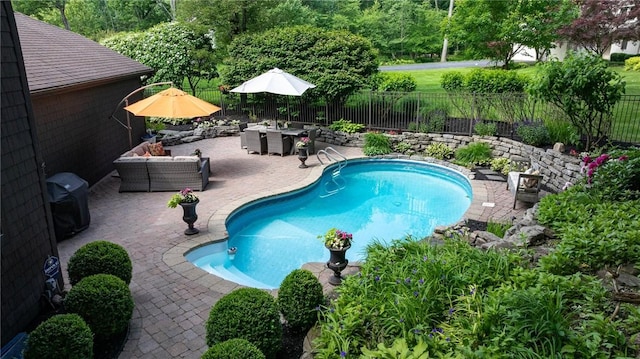 7974 Oak Brook Cir, Pittsford, NY 14534 - view of swimming pool featuring a patio, area for grilling, and outdoor dining area