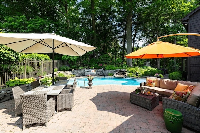 7974 Oak Brook Cir, Pittsford, NY 14534 - view of swimming pool with a patio area, an outdoor hangout area, outdoor dining area, and view of wooded area