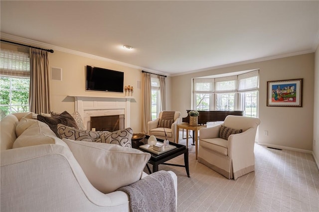 7974 Oak Brook Cir, Pittsford, NY 14534 - living room with crown molding, healthy amount of natural light, a premium fireplace, and light colored carpet