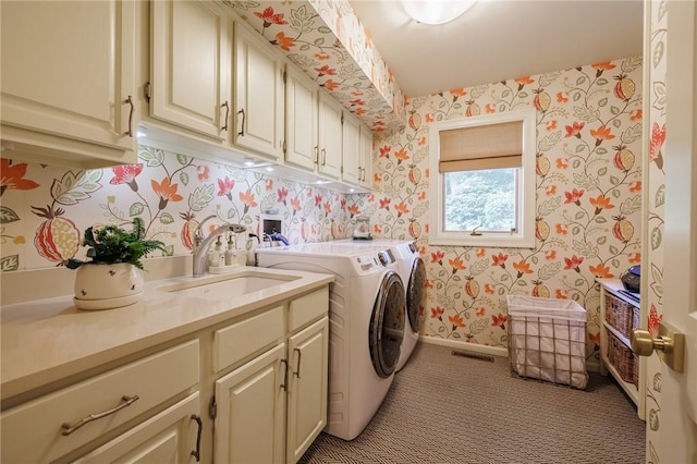 7974 Oak Brook Cir, Pittsford, NY 14534 - laundry area featuring cabinet space, wallpapered walls, washing machine and dryer, and light colored carpet