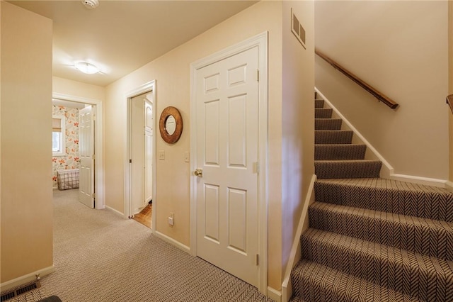 7974 Oak Brook Cir, Pittsford, NY 14534 - staircase with carpet floors and baseboards