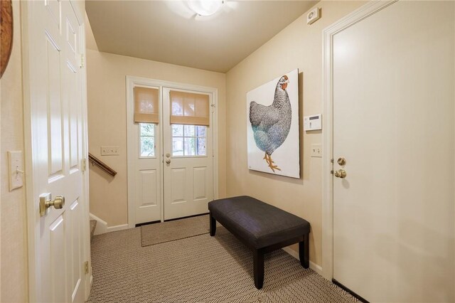 7974 Oak Brook Cir, Pittsford, NY 14534 - carpeted entrance foyer with baseboards