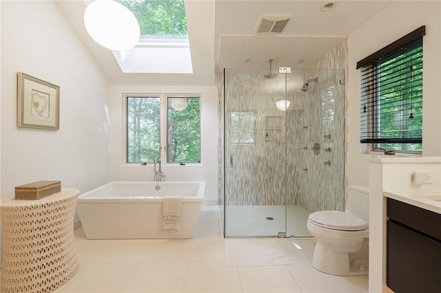 7974 Oak Brook Cir, Pittsford, NY 14534 - full bathroom featuring a freestanding bath, a stall shower, vanity, and tile patterned floors