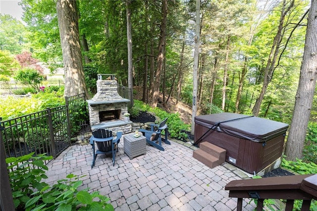 7974 Oak Brook Cir, Pittsford, NY 14534 - view of patio featuring an outdoor stone fireplace and a hot tub