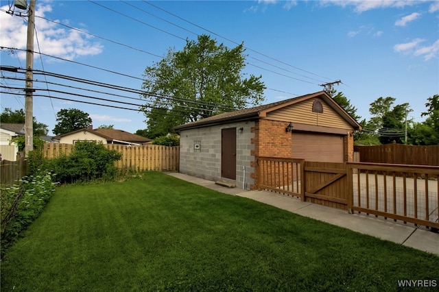774 Loretta St, Tonawanda-Town, NY 14150 - fenced backyard with a garage and an outbuilding