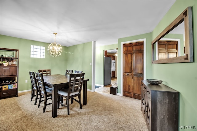 774 Loretta St, Tonawanda-Town, NY 14150 - dining room featuring light carpet and a chandelier