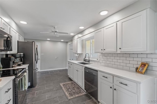 125 Huntshill Rd, Geddes, NY 13209 - kitchen with dishwasher, stainless steel electric range, decorative backsplash, a ceiling fan, and white cabinetry