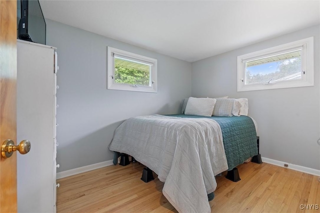 125 Huntshill Rd, Geddes, NY 13209 - bedroom featuring wood finished floors and baseboards