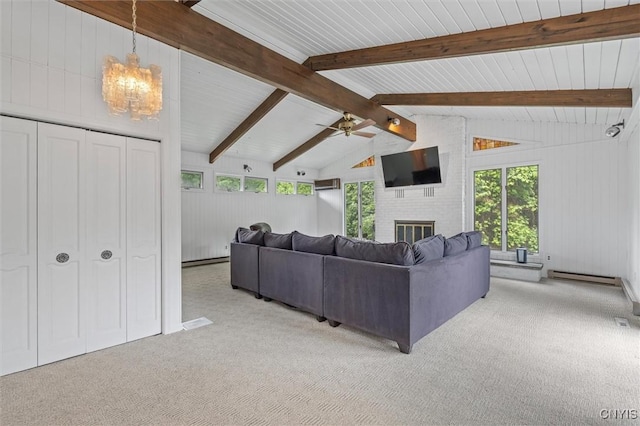 125 Huntshill Rd, Geddes, NY 13209 - living room with light carpet, a baseboard heating unit, a chandelier, and a fireplace