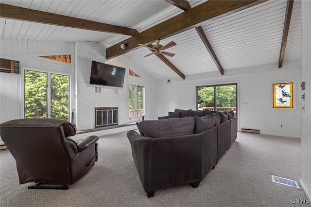 125 Huntshill Rd, Geddes, NY 13209 - living room featuring a ceiling fan, carpet flooring, a baseboard radiator, and a brick fireplace