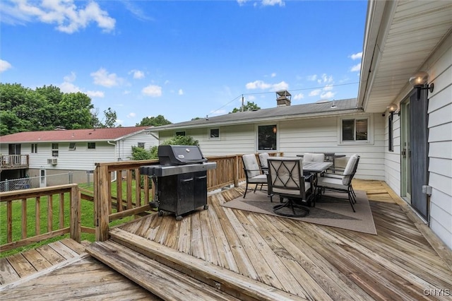 125 Huntshill Rd, Geddes, NY 13209 - wooden deck with grilling area and outdoor dining space