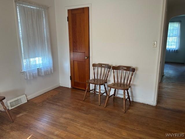 715 83rd St, Niagara Falls, NY 14304 - sitting room with arched walkways and wood finished floors