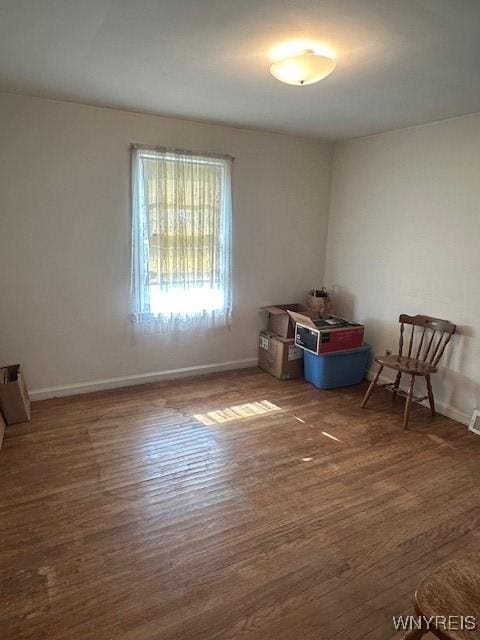 715 83rd St, Niagara Falls, NY 14304 - empty room featuring baseboards and wood finished floors