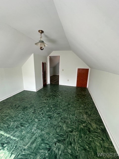 715 83rd St, Niagara Falls, NY 14304 - additional living space featuring lofted ceiling and baseboards