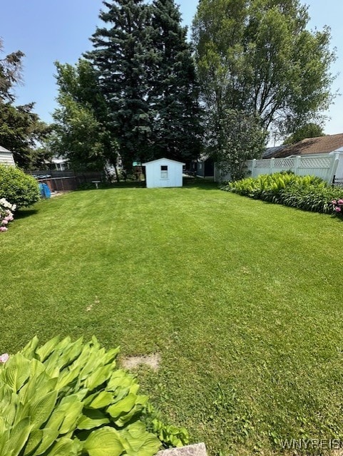 715 83rd St, Niagara Falls, NY 14304 - view of yard featuring a storage unit