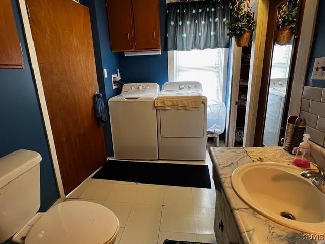 298 Maple Ridge Rd, Dekalb, NY 13681 - bathroom featuring washer and dryer, healthy amount of natural light, and vanity