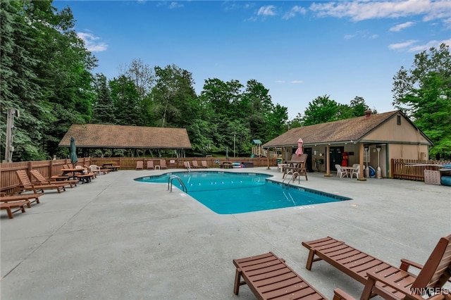 28 Woodstock Rd, Concord, NY 14069 - community pool with a patio area and view of scattered trees