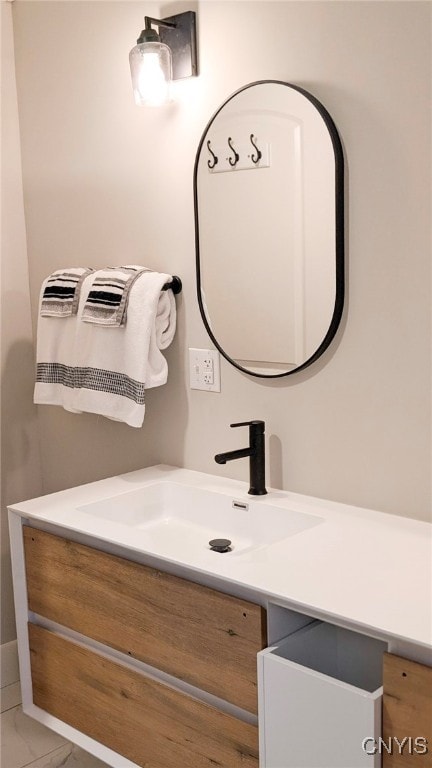 53 Utica St, Hamilton, NY 13346 - bathroom featuring vanity and marble finish floors