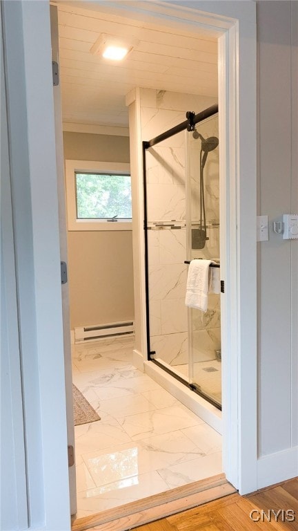 53 Utica St, Hamilton, NY 13346 - bathroom with a baseboard radiator, a marble finish shower, ornamental molding, and marble look tile flooring