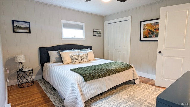 53 Utica St, Hamilton, NY 13346 - bedroom featuring wood finished floors, a closet, and ceiling fan