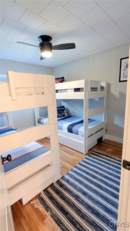 53 Utica St, Hamilton, NY 13346 - bedroom with wood finished floors and a ceiling fan