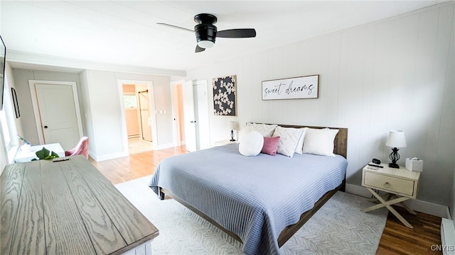 53 Utica St, Hamilton, NY 13346 - bedroom featuring light wood-style flooring, ceiling fan, and ensuite bath
