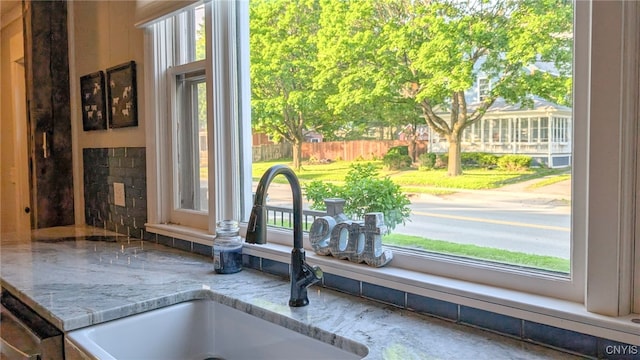 53 Utica St, Hamilton, NY 13346 - kitchen view of a sink and light stone counters