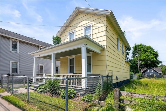 128 Clifford Ave, Rochester, NY 14621 - view of front facade with a porch