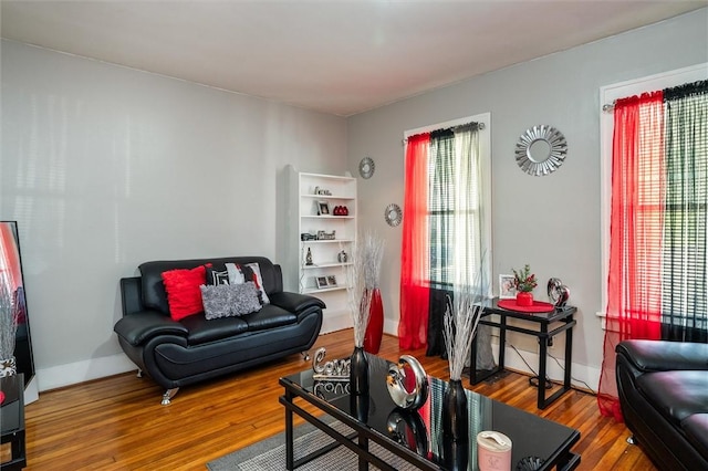 128 Clifford Ave, Rochester, NY 14621 - living room with wood finished floors and baseboards