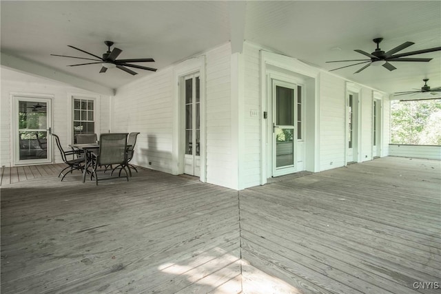 8367 S Main St, Le Ray, NY 13637 - wooden terrace with ceiling fan and outdoor dining area