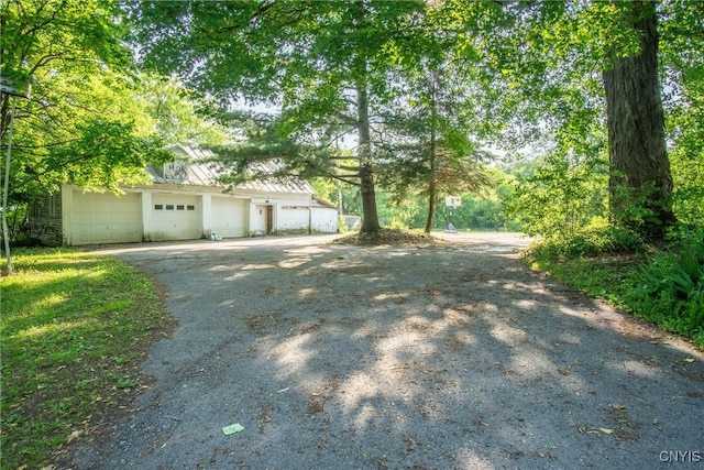 8367 S Main St, Le Ray, NY 13637 - view of front of house featuring a garage