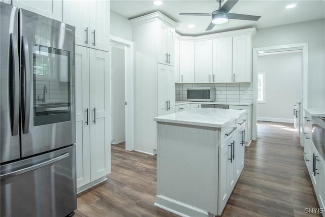 8367 S Main St, Le Ray, NY 13637 - kitchen featuring stainless steel appliances, recessed lighting, backsplash, a ceiling fan, and dark wood-style flooring