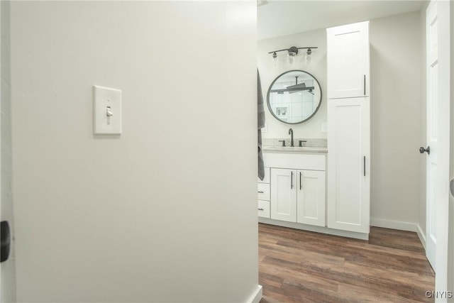 8367 S Main St, Le Ray, NY 13637 - bathroom featuring wood finished floors and vanity