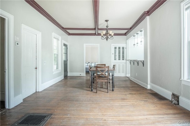 8367 S Main St, Le Ray, NY 13637 - dining area featuring a chandelier, hardwood / wood-style floors, and beamed ceiling