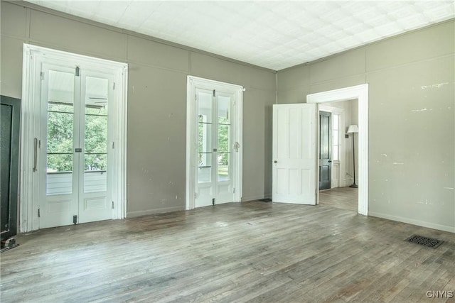 8367 S Main St, Le Ray, NY 13637 - unfurnished room featuring wood finished floors and baseboards
