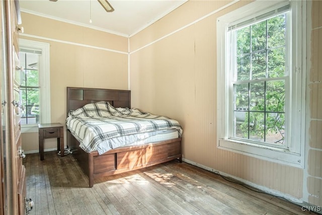 8367 S Main St, Le Ray, NY 13637 - bedroom featuring wood-type flooring, ornamental molding, and multiple windows