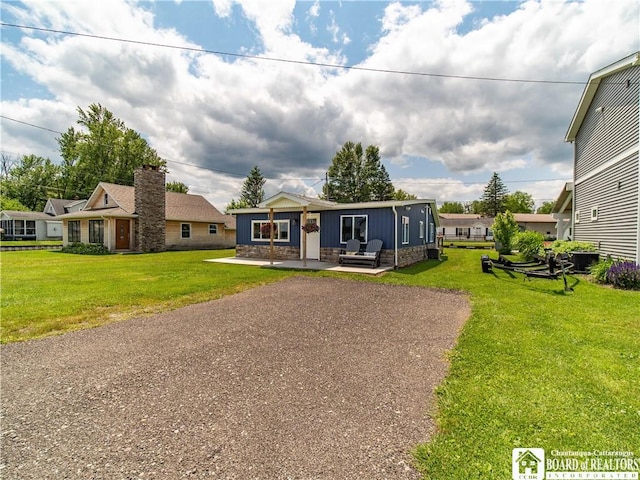 2389 Lakeside Dr, Busti, NY 14710 - view of front of property featuring a patio area and a front yard