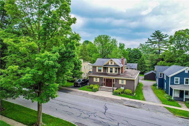 38 Sullivan St, Cazenovia, NY 13035 - view of front facade featuring a chimney