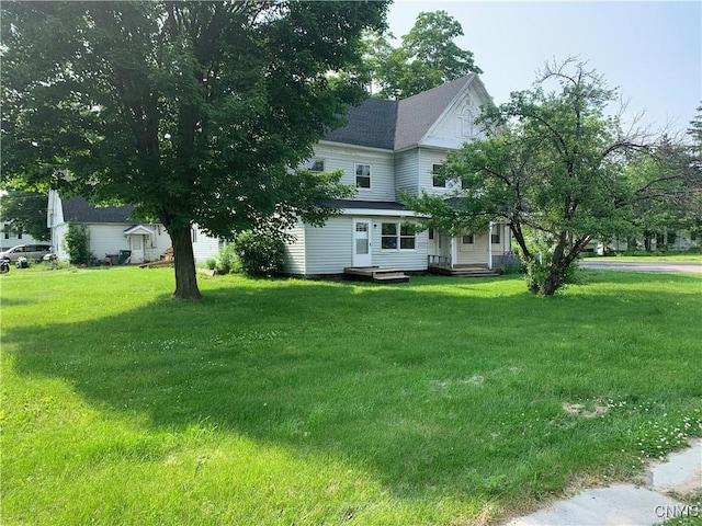 20 Park Ave, Sandy Creek, NY 13083 - view of front of house featuring a front yard