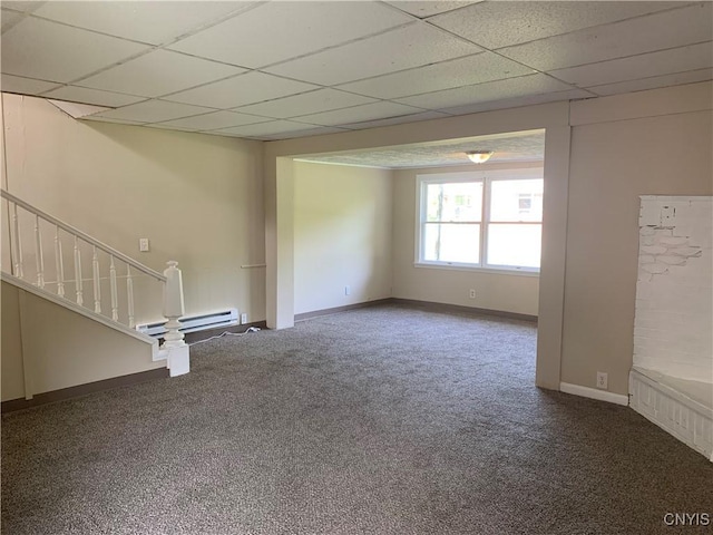 20 Park Ave, Sandy Creek, NY 13083 - carpeted spare room featuring a drop ceiling, baseboard heating, and stairway