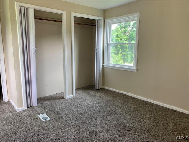 20 Park Ave, Sandy Creek, NY 13083 - unfurnished bedroom featuring carpet floors and multiple closets