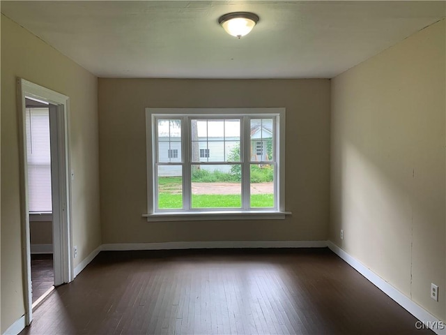 20 Park Ave, Sandy Creek, NY 13083 - empty room featuring dark wood-type flooring and baseboards