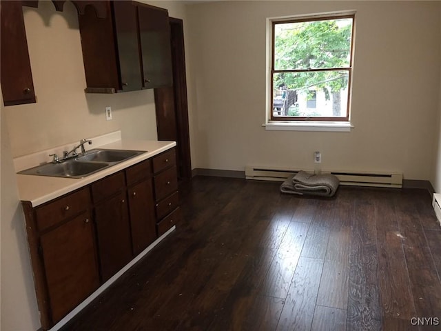 20 Park Ave, Sandy Creek, NY 13083 - kitchen featuring dark wood-style flooring, light countertops, and dark brown cabinetry
