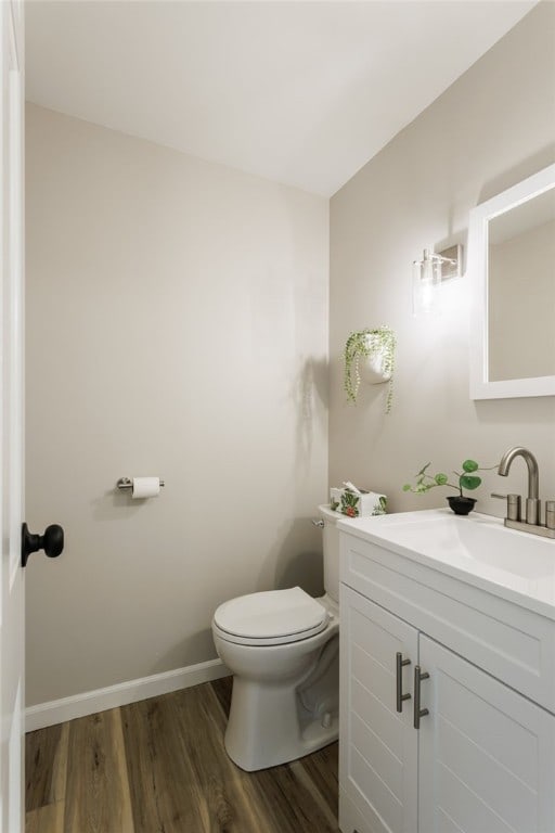 16 Aquarius Ln, Greece, NY 14612 - half bathroom with vanity and wood finished floors