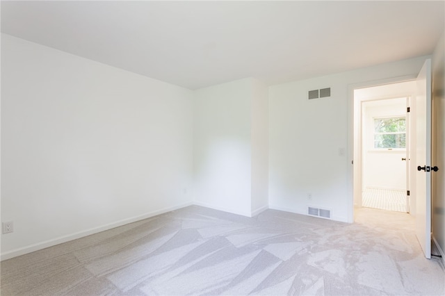 16 Aquarius Ln, Greece, NY 14612 - empty room with light carpet and baseboards