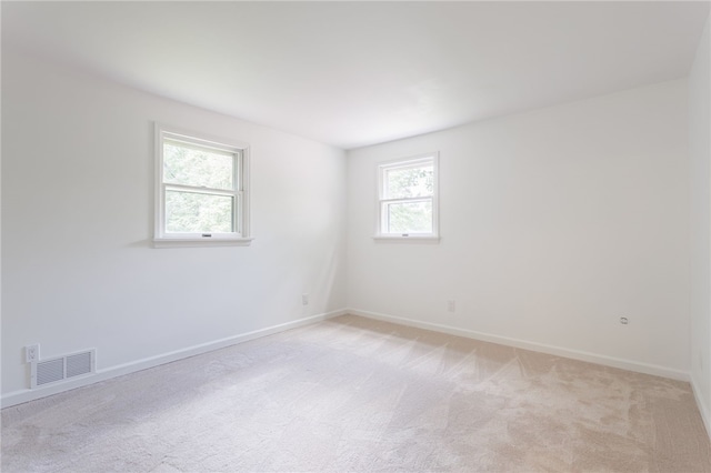 16 Aquarius Ln, Greece, NY 14612 - empty room with light colored carpet and baseboards